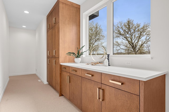 4919 Three Points Blvd, Mound, MN 55364 - bar featuring light carpet, recessed lighting, and baseboards