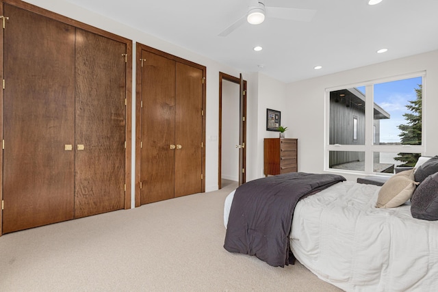 4919 Three Points Blvd, Mound, MN 55364 - bedroom with carpet flooring, two closets, recessed lighting, and a ceiling fan