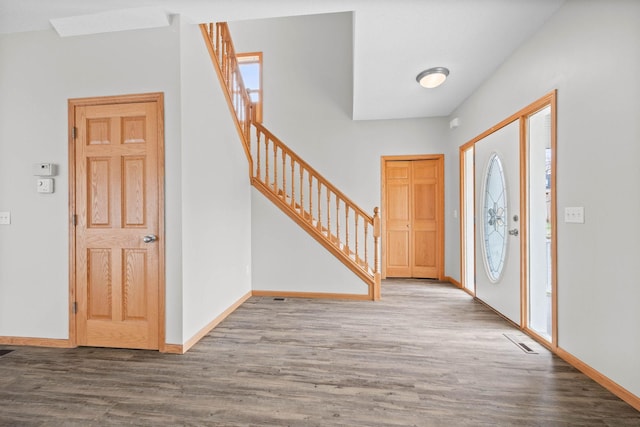 3014 39th St, Minneapolis, MN 55406 - entrance foyer with wood finished floors, baseboards, and stairway