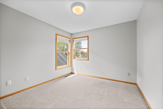 3014 39th St, Minneapolis, MN 55406 - carpeted spare room with baseboards