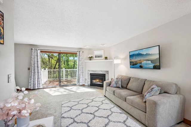 3664 Abbey Way Unit C, Eagan, MN 55123 - living room with a fireplace, carpet flooring, and a textured ceiling