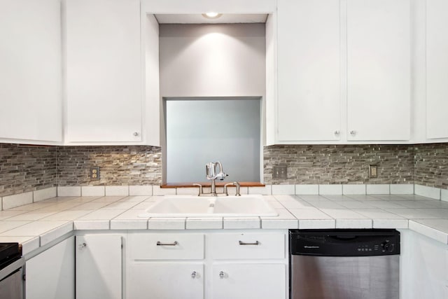 3664 Abbey Way Unit C, Eagan, MN 55123 - kitchen with dishwasher, white cabinets, a sink, and decorative backsplash