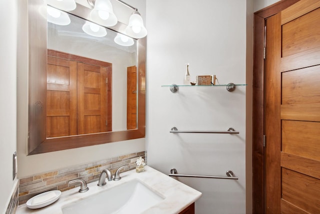 3664 Abbey Way Unit C, Eagan, MN 55123 - bathroom featuring decorative backsplash and vanity