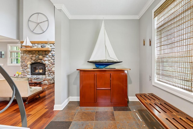 16710 Edgewood Ave, Wayzata, MN 55391 - sitting room featuring crown molding and a stone fireplace