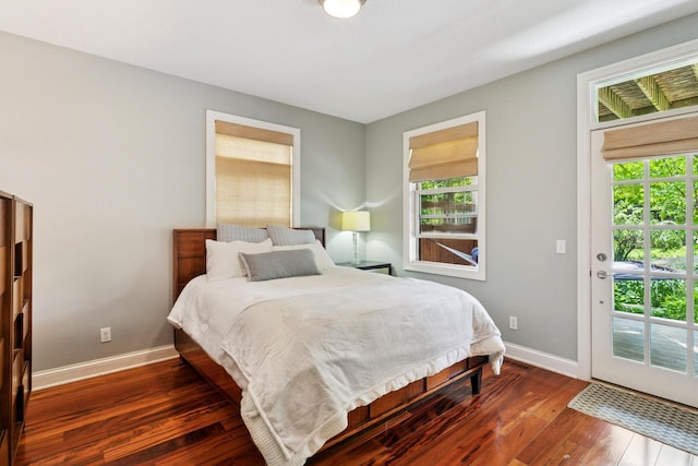 16710 Edgewood Ave, Wayzata, MN 55391 - bedroom featuring access to exterior, multiple windows, and hardwood / wood-style floors