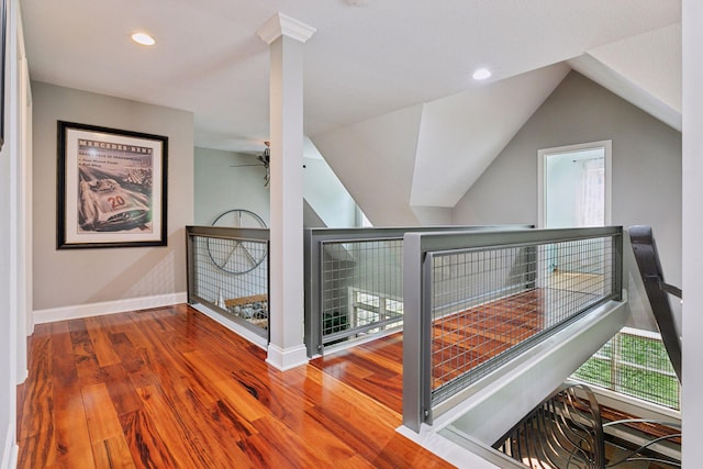 16710 Edgewood Ave, Wayzata, MN 55391 - hall featuring an upstairs landing, wood finished floors, vaulted ceiling, and recessed lighting