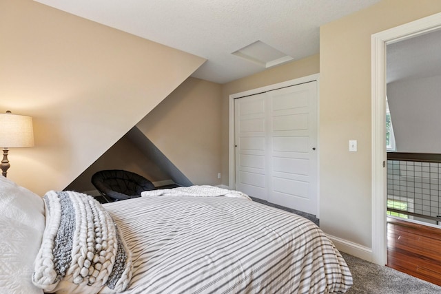 16710 Edgewood Ave, Wayzata, MN 55391 - carpeted bedroom featuring attic access and a closet