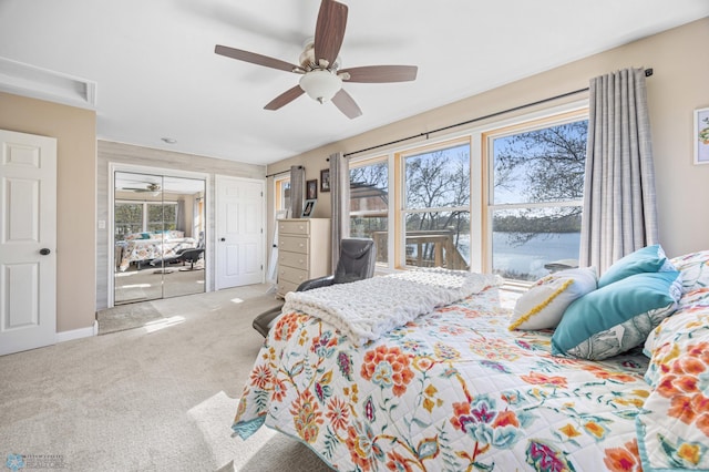 15344 Blackhawk Rd, Lake Eunice Twp, MN 56511 - bedroom featuring carpet flooring, multiple windows, a water view, and a ceiling fan