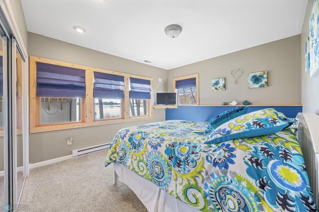 15344 Blackhawk Rd, Lake Eunice Twp, MN 56511 - carpeted bedroom featuring a baseboard radiator and baseboards