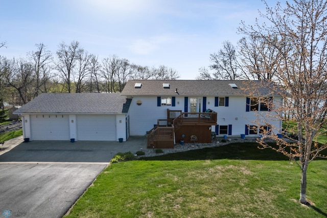 15344 Blackhawk Rd, Lake Eunice Twp, MN 56511 - view of front of home with a front lawn, a garage, stairs, a wooden deck, and roof with shingles