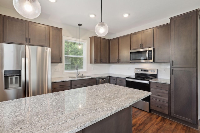 2219 Youngman Ave, Saint Paul, MN 55116 - kitchen with backsplash, stainless steel appliances, recessed lighting, and a sink