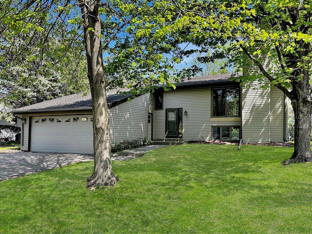 3158 Quarry Ct, Eagan, MN 55121 - view of front of house with a garage, a front yard, and driveway