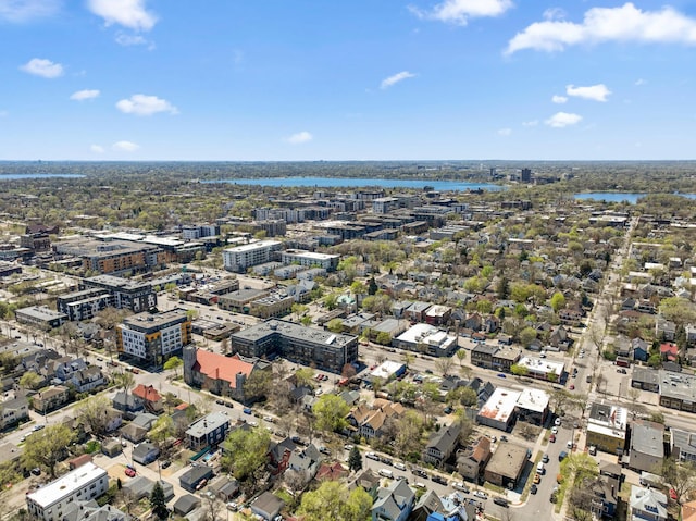 bird's eye view featuring a city view and a water view