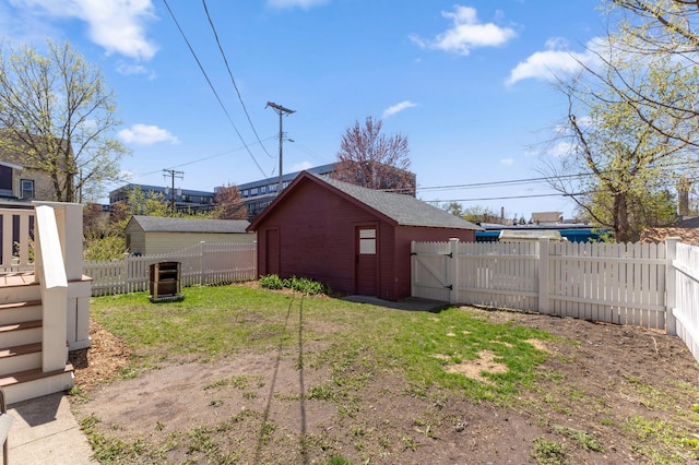 view of yard featuring a gate and a fenced backyard