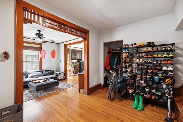 interior space featuring ceiling fan and hardwood / wood-style flooring