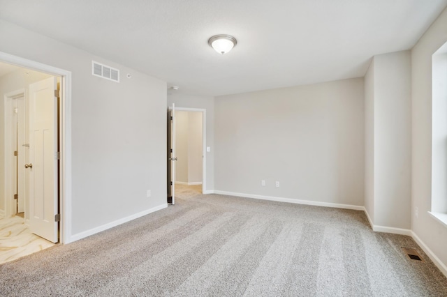6742 Wildflower Way, Minnetrista, MN 55331 - empty room with carpet flooring and baseboards