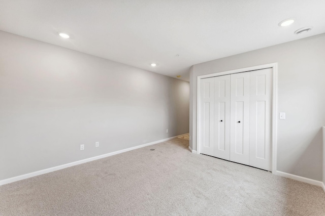 6742 Wildflower Way, Minnetrista, MN 55331 - unfurnished bedroom with carpet, recessed lighting, and a closet