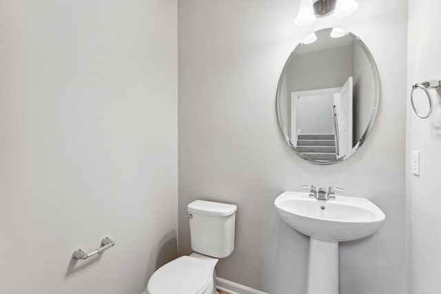 6742 Wildflower Way, Minnetrista, MN 55331 - half bathroom with toilet and a sink
