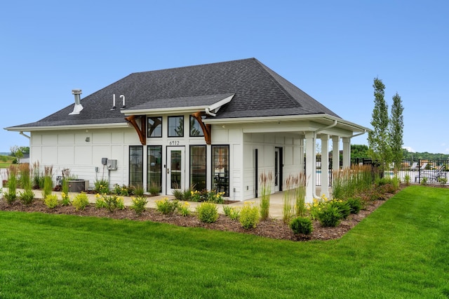 6742 Wildflower Way, Minnetrista, MN 55331 - rear view of house with a shingled roof
