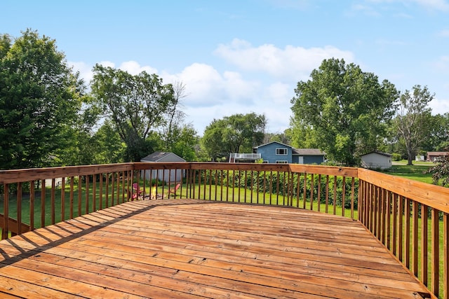6913 Sumac Ct, Centerville, MN 55038 - wooden terrace with a lawn and view of scattered trees