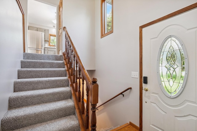 6913 Sumac Ct, Centerville, MN 55038 - entryway featuring plenty of natural light and stairs