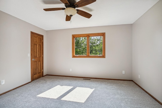 6913 Sumac Ct, Centerville, MN 55038 - unfurnished room featuring carpet flooring and a ceiling fan