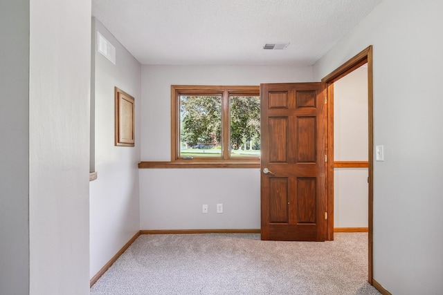 6913 Sumac Ct, Centerville, MN 55038 - spare room featuring carpet floors and baseboards