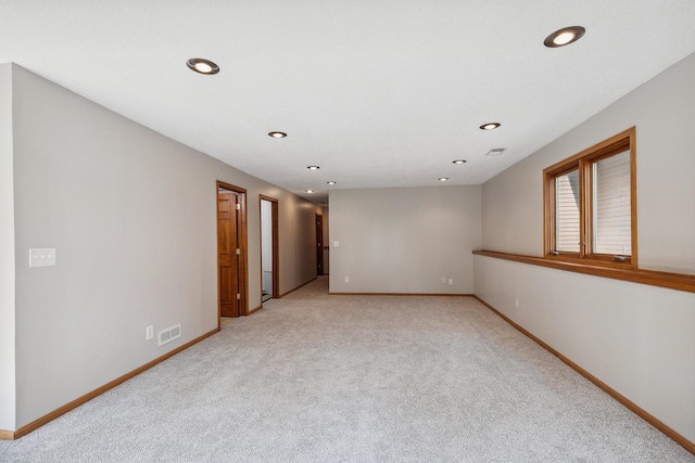 6913 Sumac Ct, Centerville, MN 55038 - unfurnished room featuring light carpet and recessed lighting