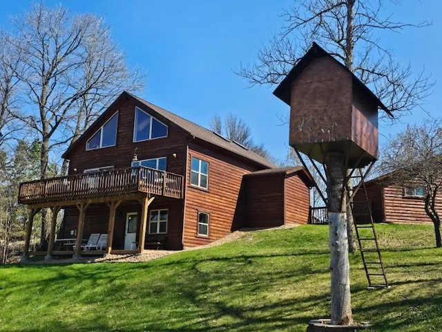19319 Elsie Way NW, Bemidji, MN 56601 - rear view of house featuring a yard and a wooden deck
