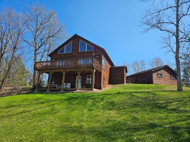 19319 Elsie Way NW, Bemidji, MN 56601 - rear view of house featuring a yard and a deck
