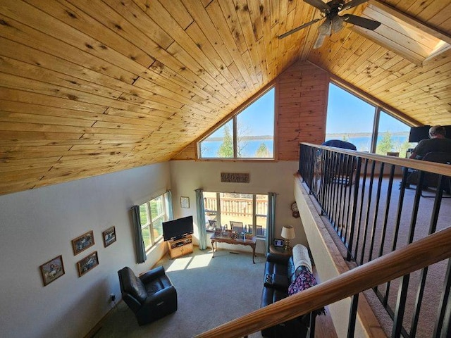 19319 Elsie Way NW, Bemidji, MN 56601 - carpeted living area featuring wood ceiling, ceiling fan, and high vaulted ceiling