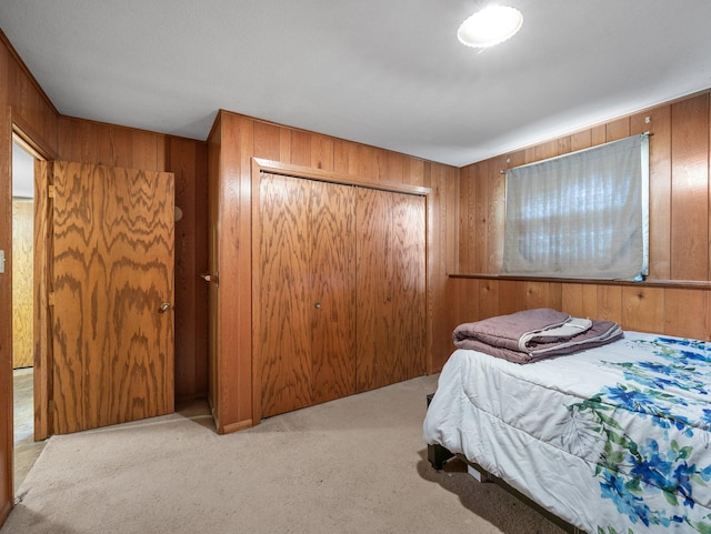 1716 9th Ave SE, Saint Cloud, MN 56304 - carpeted bedroom featuring wooden walls and a closet