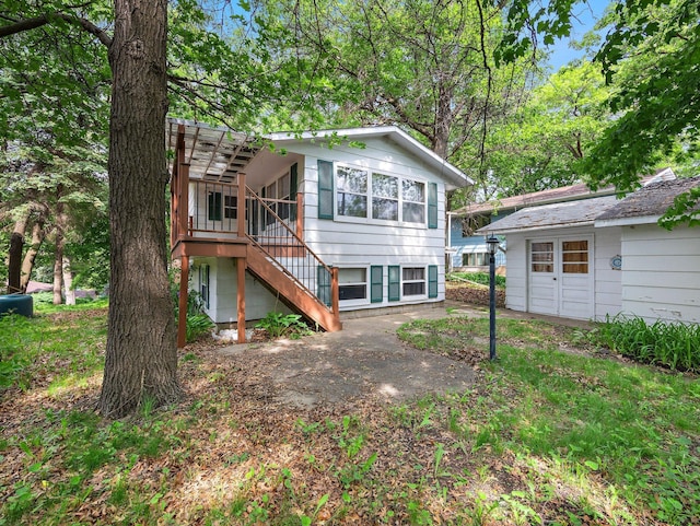 1716 9th Ave SE, Saint Cloud, MN 56304 - back of house featuring stairs and a deck