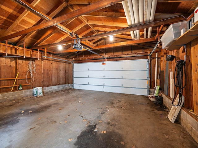 1716 9th Ave SE, Saint Cloud, MN 56304 - garage featuring a garage door opener