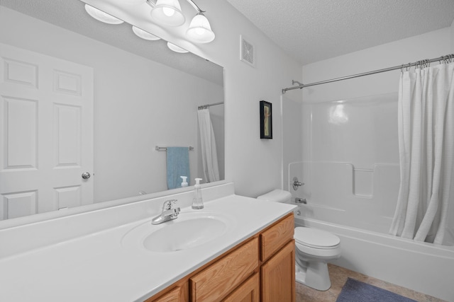 bathroom featuring toilet, vanity, a textured ceiling, visible vents, and shower / bath combo