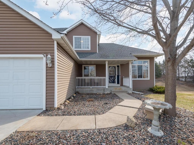13852 Jasmine Way, Rogers, MN 55374 - view of front of house featuring a porch, an attached garage, and roof with shingles