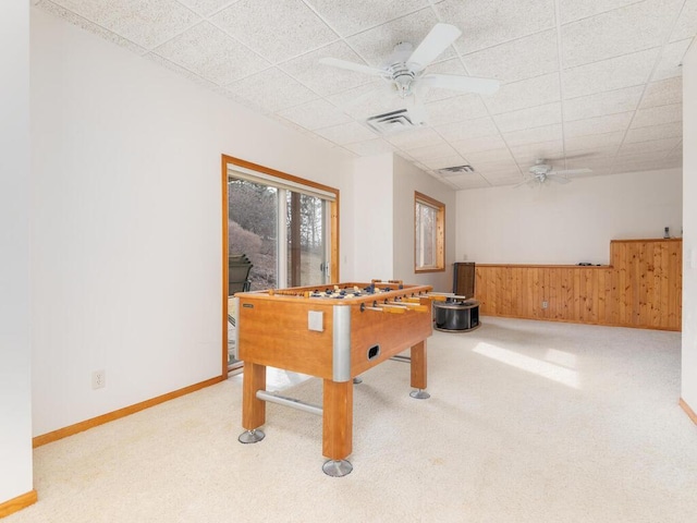 13852 Jasmine Way, Rogers, MN 55374 - recreation room with ceiling fan, a drop ceiling, carpet, wainscoting, and baseboards