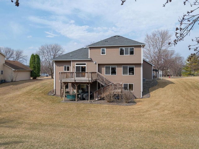 13852 Jasmine Way, Rogers, MN 55374 - rear view of property featuring stairs, a deck, a yard, and roof with shingles