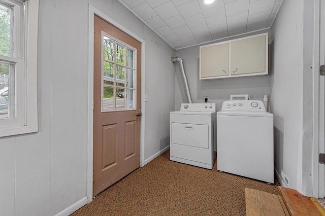 108 Benjamin St, Jackson, MN 56143 - laundry room with cabinet space, washing machine and dryer, baseboards, and carpet