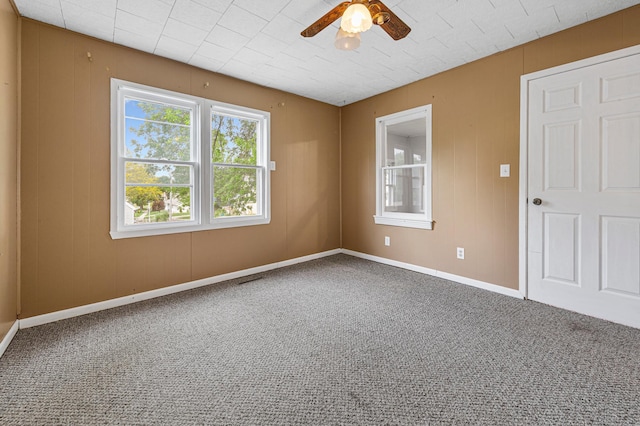 108 Benjamin St, Jackson, MN 56143 - carpeted empty room featuring a ceiling fan and baseboards