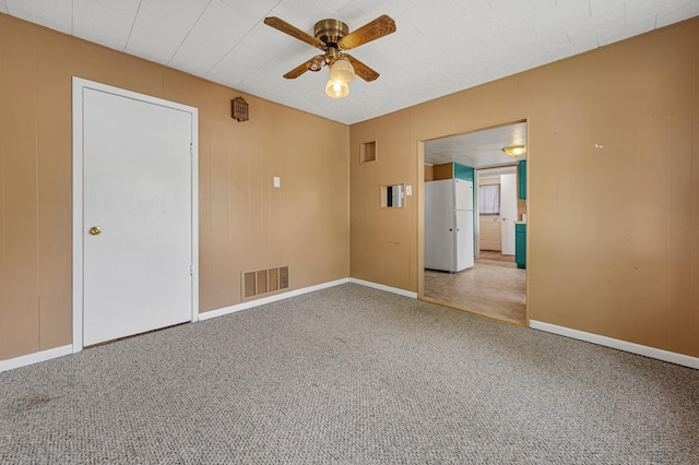 108 Benjamin St, Jackson, MN 56143 - carpeted spare room with ceiling fan and baseboards