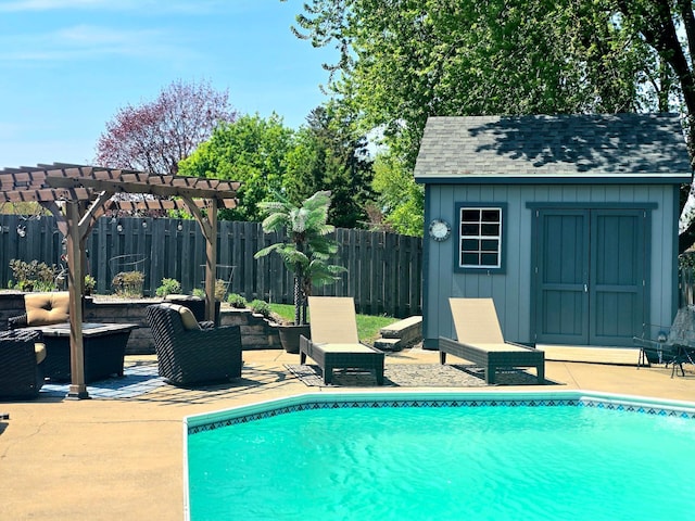 view of swimming pool with a patio, an outdoor structure, a fenced backyard, a pergola, and a shed