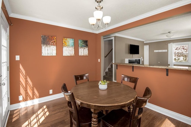 dining area featuring stairway, baseboards, dark wood-type flooring, a chandelier, and crown molding