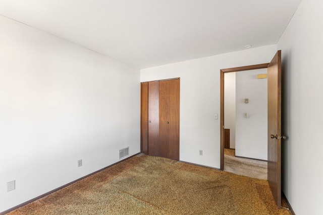 1635 140th St, Burnsville, MN 55337 - unfurnished bedroom featuring carpet and a closet