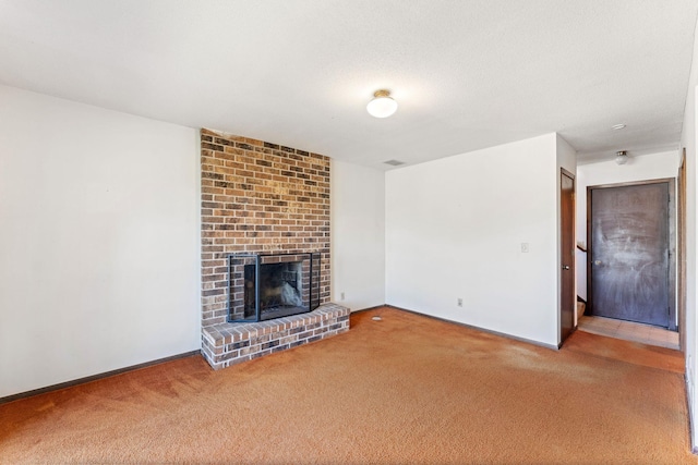 1635 140th St, Burnsville, MN 55337 - unfurnished living room featuring carpet floors, a fireplace, and baseboards