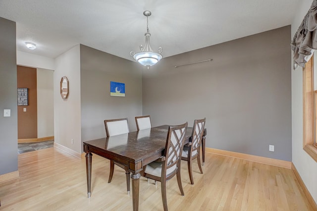 347 Glover Rd, Troy Twp, WI 54022 - dining area featuring light wood-style flooring and baseboards