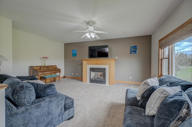 347 Glover Rd, Troy Twp, WI 54022 - carpeted living area with a fireplace, baseboards, and a ceiling fan