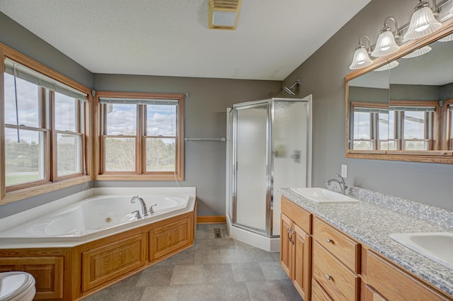 347 Glover Rd, Troy Twp, WI 54022 - bathroom with a stall shower, a jetted tub, double vanity, and a sink