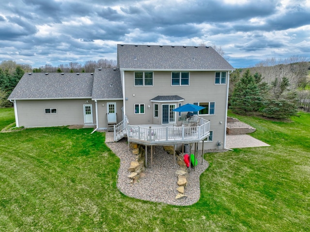 347 Glover Rd, Troy Twp, WI 54022 - back of property with a yard, roof with shingles, and a wooden deck