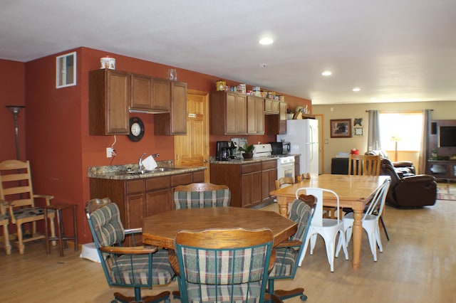 36282 Rush Lake Loop Unit 29A, Ottertail, MN 56571 - dining area featuring light wood-style floors and recessed lighting